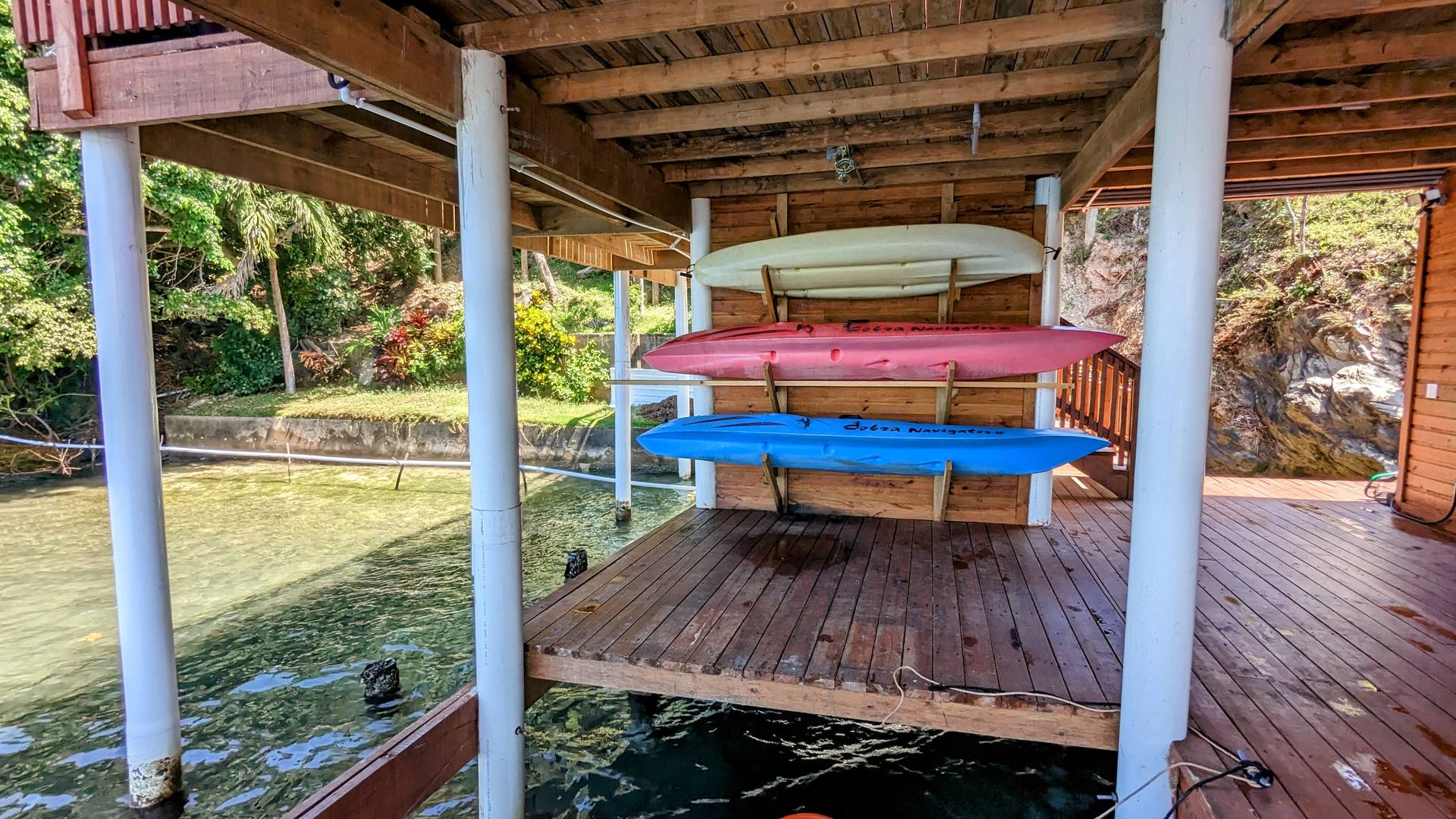 Kayaks at the dock at El Palacio Rosa