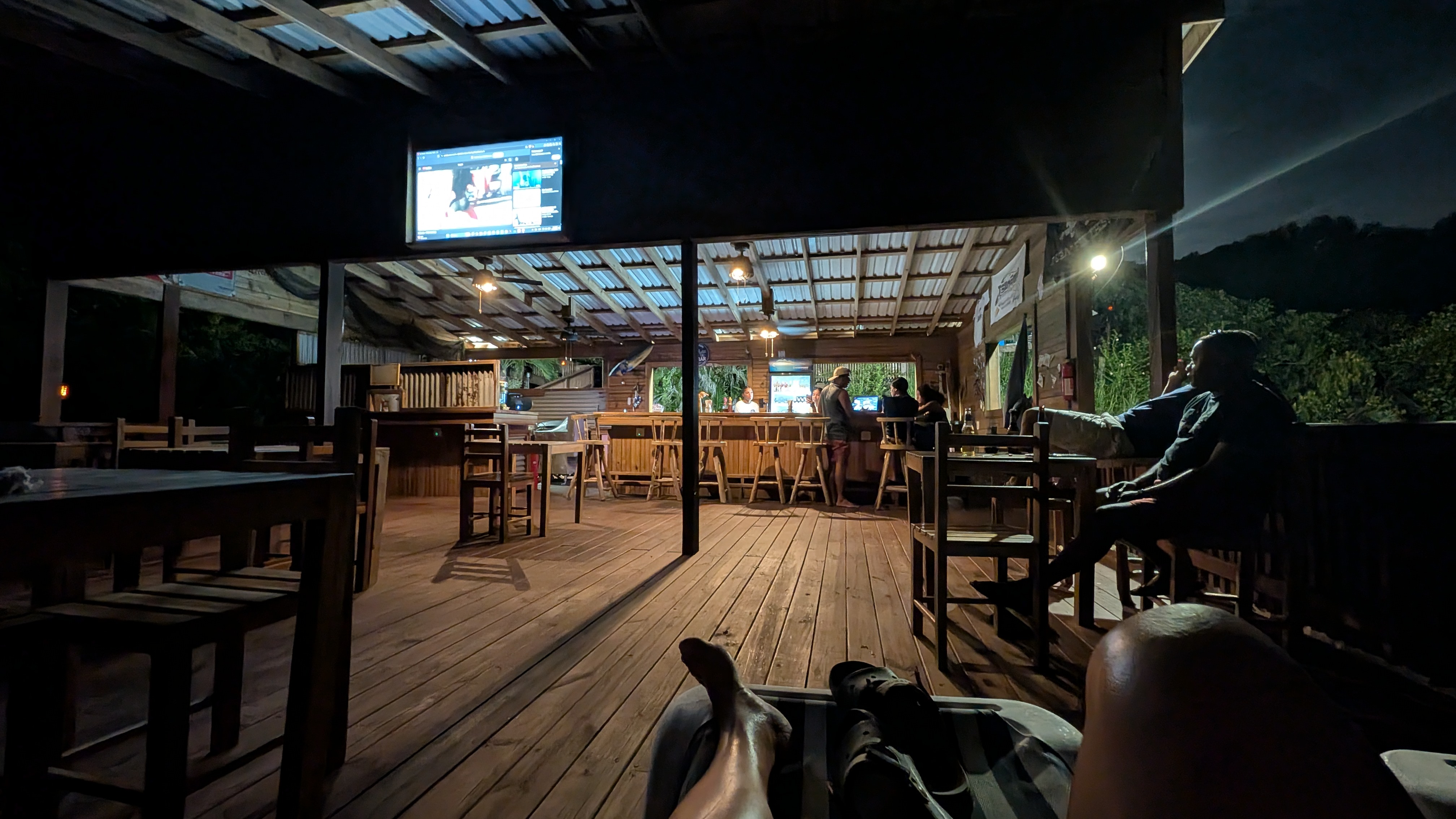 The bar at La Rosa at night, Roatán